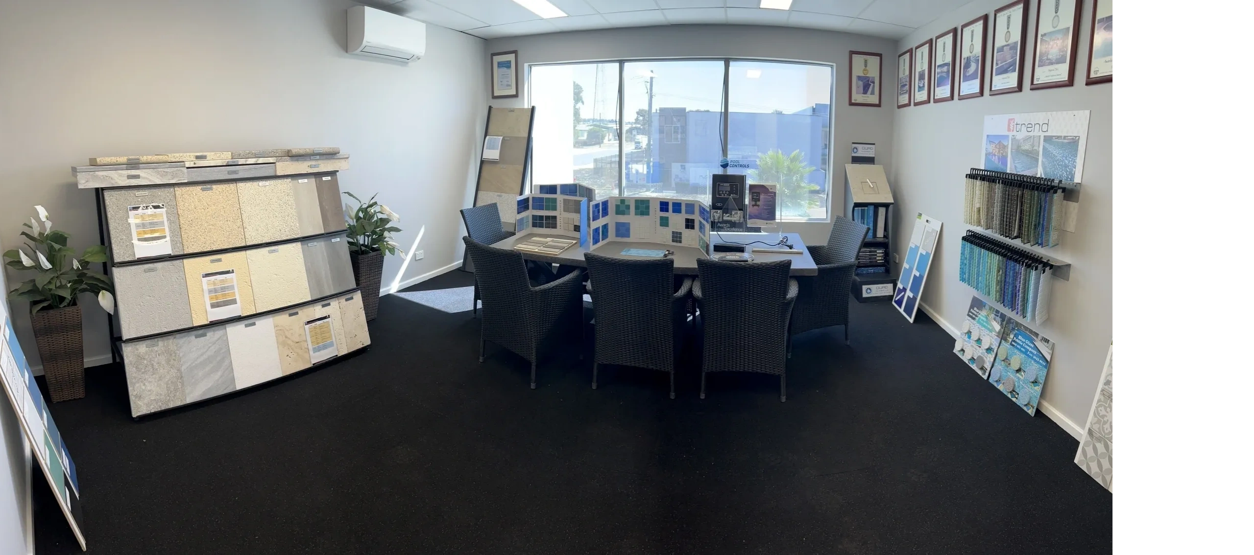 Imperial Pools showroom with tile and finish samples